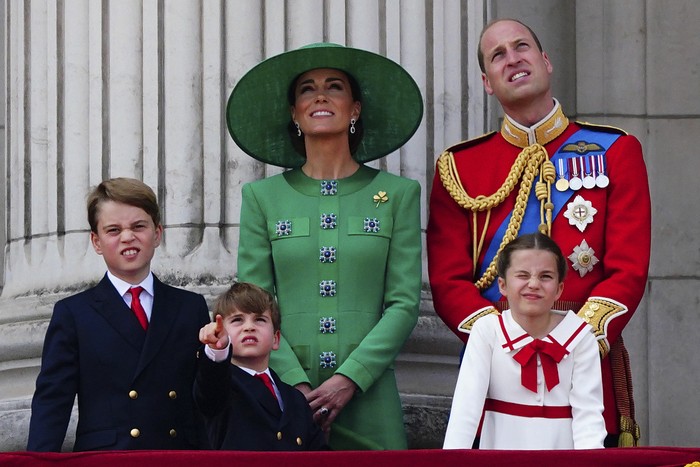 From left, Britain's Prince George, Prince Louis,, Kate, Princess of Wales,  Prince William, and Princess Charlotte, view the flypast from the balcony of Buckingham Palace following the Trooping the Colour ceremony in central London, Saturday June 17, 2023. (Victoria Jones/PA via AP)