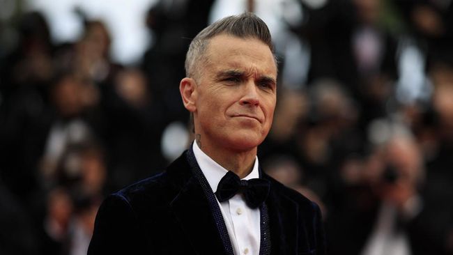 Musisi Robbie Williams bercerita tentang ketidaknyamanan yang dirasakannya saat berinteraksi dengan orang lain, termasuk dengan fan.