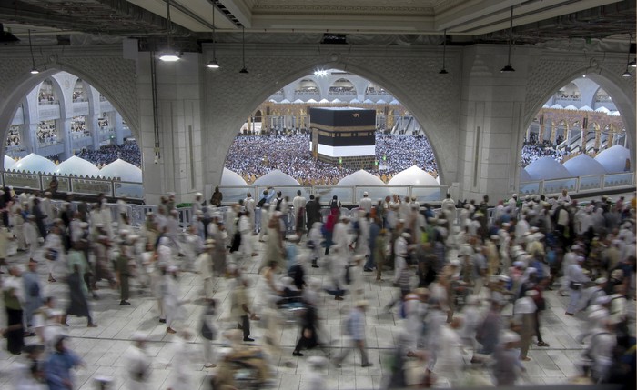 Thousands of Muslim pilgrims hold umbrellas as they circumambulate around the Kaaba, the cubic building at the Grand Mosque, during the annual hajj pilgrimage, in Mecca, Saudi Arabia, Sunday, June 25, 2023. Muslim pilgrims are converging on Saudi Arabia's holy city of Mecca for the largest Hajj since the coronavirus pandemic severely curtailed access to one of Islam's five pillars. (AP Photo/Amr Nabil) Thousands of Muslim pilgrims hold umbrellas as they circumambulate around the Kaaba, the cubic building at the Grand Mosque, during the annual hajj pilgrimage, in Mecca, Saudi Arabia, Sunday, June 25, 2023. Muslim pilgrims are converging on Saudi Arabia's holy city of Mecca for the largest Hajj since the coronavirus pandemic severely curtailed access to one of Islam's five pillars. (AP Photo/Amr Nabil)