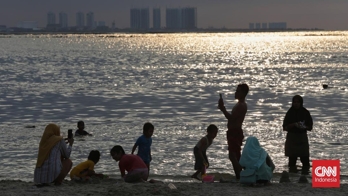 FOTO: Ancol Ramai Wisatawan Saat Libur Cuti Bersama Iduladha