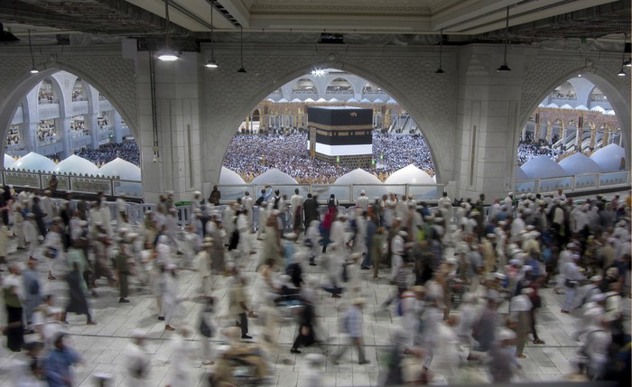 Muslim pilgrims circumambulate around the Kaaba, the cubic structure at the Grand Mosque, during the annual hajj pilgrimage, in Mecca, Saudi Arabia, Saturday, June 24, 2023. Muslim pilgrims are converging on Saudi Arabia's holy city of Mecca for the largest hajj since the coronavirus pandemic severely curtailed access to one of Islam's five pillars. (AP Photo/Amr Nabil)