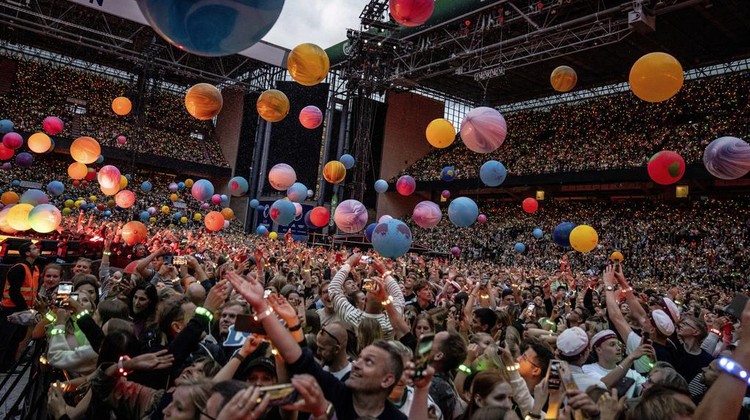 British singer Chris Martin of British band Coldplay performs at Parken Stadium in Copenhagen, Denmark, Wednesday July 5, 2023. The concert is part of the Music of the Spheres World Tour. (Mads Claus Rasmussen/Ritzau Scanpix via AP)