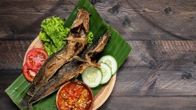 Lele Goreng sambal bawang or Fried Catfish is traditional Indonesian culinary food. Catfish and garlic chilli sauce.