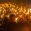 Sejumlah warga mengikuti pawai obor di Jalan Keramat Raya, Banjarmasin, Kalimantan Selatan, Selasa (18/7/2023). Pawai obor yang diikuti ratusan warga Kota Banjarmasin tersebut digelar dalam rangka menyambut Tahun Baru Islam 1 Muharram 1445 Hijriah. A