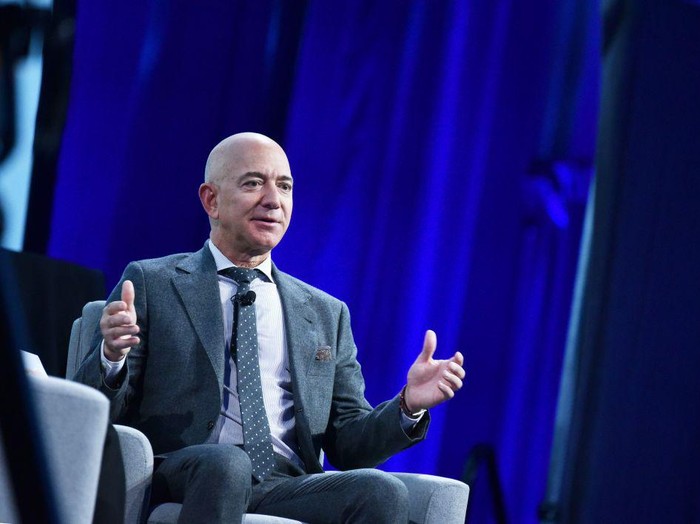 Blue Origin founder Jeff Bezos speaks after receiving the 2019 International Astronautical Federation (IAF) Excellence in Industry Award during the the 70th International Astronautical Congress at the Walter E. Washington Convention Center in Washington, DC on October 22, 2019. (Photo by MANDEL NGAN / AFP) (Photo by MANDEL NGAN/AFP via Getty Images)