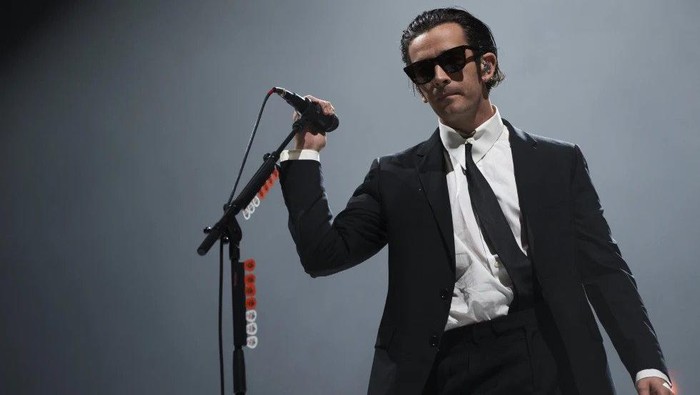 FILE - Matty Healy of the 1975 performs at the Reading Music Festival, England, Sunday, Aug. 28, 2022. Malaysia’s government has cut short a music festival after the lead singer of British band The 1975 slammed the country’s anti-gay laws and kissed a male bandmate during their performance. Malaysia’s communications and digital minister has slammed Matty Healy’s conduct late Friday, July 21, 2023 at the start of the Good Vibes Festival as “very rude.” (Photo by Scott Garfitt/Invision/AP, file)