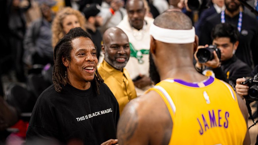 LOS ANGELES, CA - FEBRUARY 7: LeBron James #6 of the Los Angeles Lakers speaks with Jay Z after breaking Kareem Abdul-Jabbars all time scoring record of 38,387 points during the game against the Oklahoma City Thunder on February 7, 2023 at Crypto.Com Arena in Los Angeles, California. NOTE TO USER: User expressly acknowledges and agrees that, by downloading and/or using this Photograph, user is consenting to the terms and conditions of the Getty Images License Agreement. Mandatory Copyright Notice: Copyright 2023 NBAE (Photo by Zach Beeker/NBAE via Getty Images)