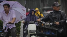 FOTO: Curah Hujan di Beijing Tertinggi dalam 140 Tahun