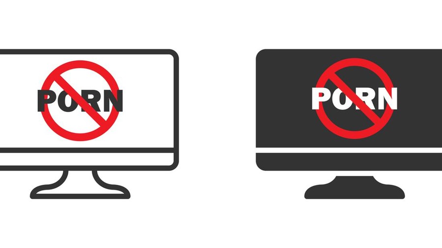 Ilustrasi larangan nonton film dewasa No porn icon on computer desktop screen. Porn forbidden icon