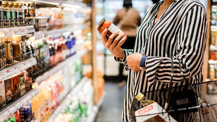 Bangkok, THAILAND - August 5, 2019: Woman chooses products in the supermarket, Ready-made food, Shopping .
