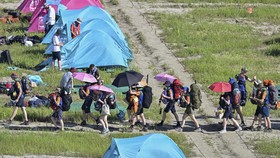 FOTO: Pesta Jambore Pramuka Sedunia Kusut Gegara Topan Khanun