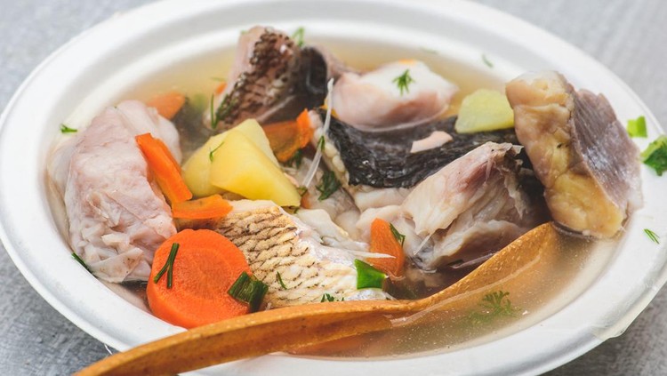 Hot fish soup with various vegetables in Kaziuko Muge or Saint Casimir's Fair, a spring annual folk arts and crafts fair in Vilnius, Lithuania, Europe