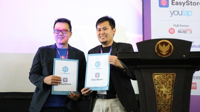 Exabytes dan EasyStore, dua perusahaan penyedia solusi digital, menandatangani Memorandum of Understanding (MoU) untuk bersinergi dalam membantu UMKM Indonesia.
