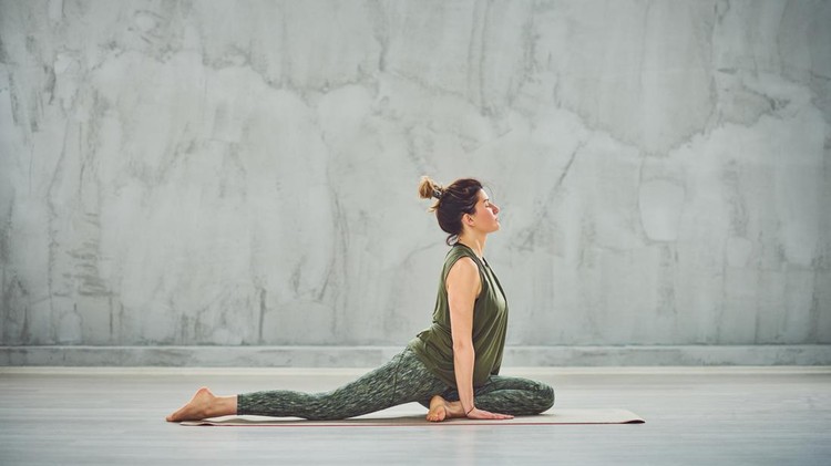 yoga baby pigeon pose.