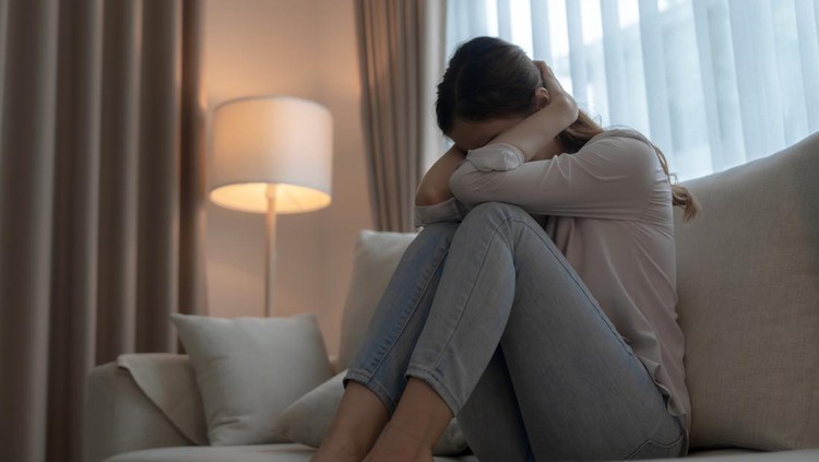 Ilustrari Anxiety Disorder Stressed young woman alone in the room.