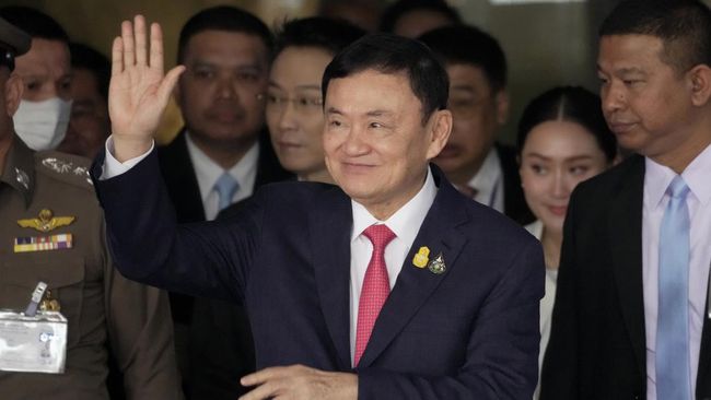 Why was former PM Thaksin imprisoned after returning to Thailand?