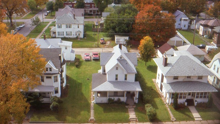 Aerial view of small town Iowa, USA. 1985. Agfachrome scanned film with grain.