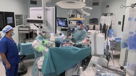 Medical staff operate a robotic surgery on a cancer patient, at King Hussein Cancer Centre in Amman, Jordan, August 22, 2023. REUTERS/Jehad Shelbak