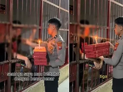Aksi Polisi Bagi-bagi Makanan Gratis kepada Tahanan Dipuji Netizen