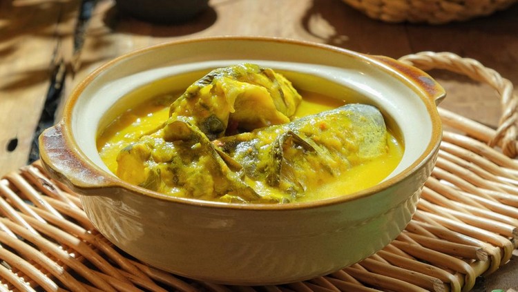 Ilustrasi gulai ikan patin Ikan Patin Masak Tempoyak in a pot Ikan. Patin Tempoyak is a famous Malaysian heritage dish and it taste spicy.