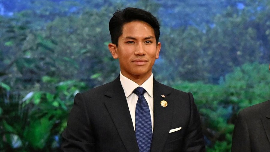 Brunei’s Prime Minister Hassanal Bolkiah (2nd L) and Prince Abdul Mateen (L) are welcomed by Indonesia’s President Joko Widodo (2nd R) and First Lady Iriana Widodo upon their arrival for the ASEAN Summit in Jakarta on September 5, 2023.     ADEK BERRY/Pool via REUTERS