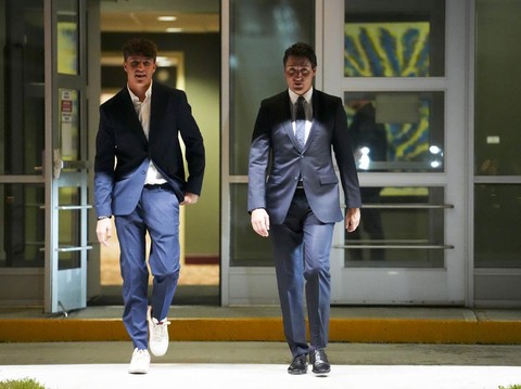 Canadian Prime Minister Justin Trudeau, center, and his son, Xavier, depart Ottawa, Ontario, on Sunday, Sept. 3, 2023. Trudeau will travel to Indonesia, Singapore and India. (Sean Kilpatrick/The Canadian Press via AP)