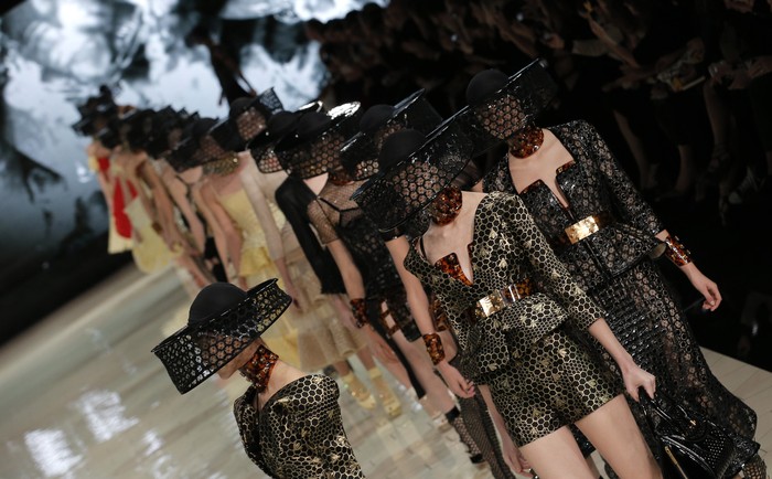A model wears a creation by British designer Sarah Burton for Alexander McQueen as part of the ready to wear Spring-Summer 2013 collection, in Paris, Tuesday, Oct. 2, 2012. (AP Photo/Francois Mori)