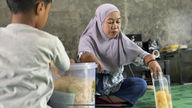 Buah Manis Kegigihan Nasabah Disabilitas Binaan PNM, Bisa Bangun Rumah