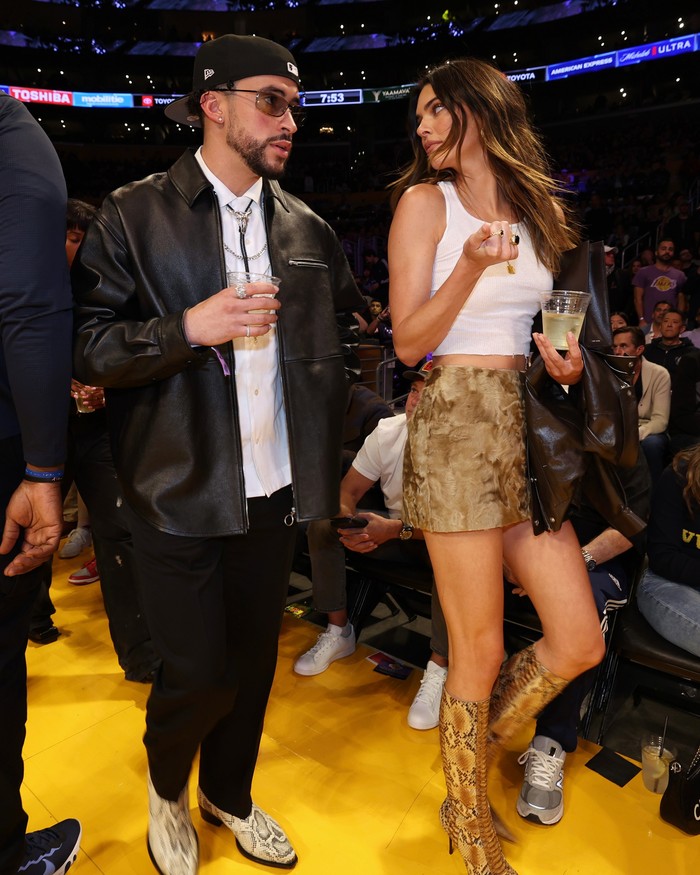 LOS ANGELES, CA - MAY 12: Rapper Bad Bunny and Kendall Jenner attends Game Six of the Western Conference Semi-Finals of the 2023 NBA Playoffs between Golden State Warriors against the Los Angeles Lakers on May 12, 2023 at Crypto.com Arena in Los Angeles, California. NOTE TO USER: User expressly acknowledges and agrees that, by downloading and/or using this Photograph, user is consenting to the terms and conditions of the Getty Images License Agreement. Mandatory Copyright Notice: Copyright 2023 NBAE (Photo by Jim Poorten/NBAE via Getty Images)