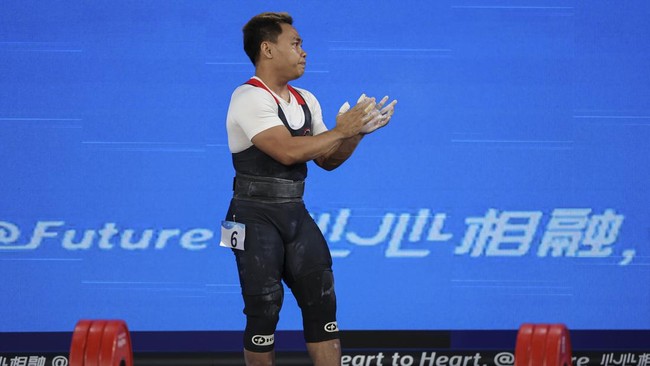 Eko Yuli Irawan tak bisa menutupi kekecewaan usai gagal mengibarkan merah putih di Asian Games.