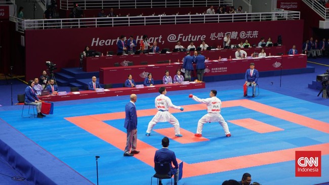 Ignatius Joshua Kandou meraih medali emas kareta nomor 75kg putra di SEA Games 2025, usai menghajar wakil Vietnam.