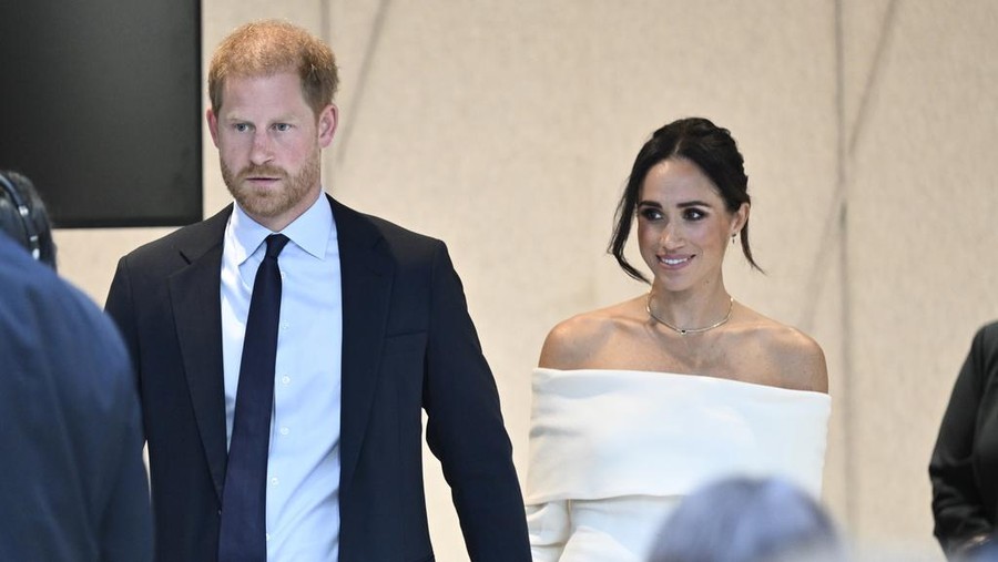Britain's Prince Harry, The Duke of Sussex, left, and Meghan, Duchess of Sussex, participate in The Archewell Foundation Parents' Summit 
