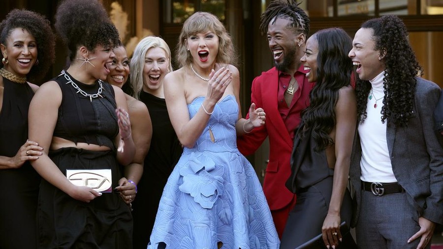 Taylor Swift arrives at the world premiere of the concert film 
