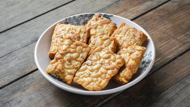 Fried Tempeh or Tempe is a traditional Malay dish snack popular in Malaysian, Indonesian, and Singapore