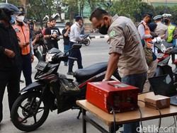 Nah Lho! Sudah Rajin Ganti Oli, Pemotor Ini Tetap Kena Tilang Uji Emisi