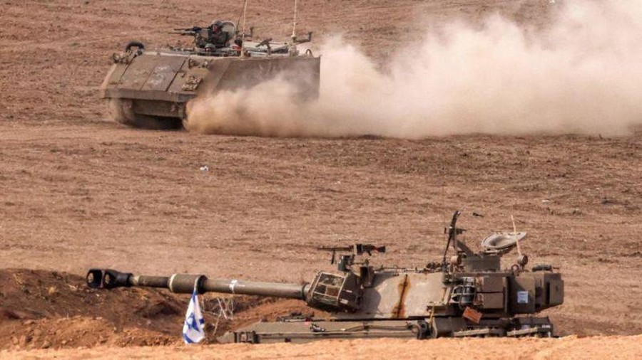 Pasukan Israel berpatroli di dekat perbatasan Jalur Gaza Pasukan Israel berpatroli di dekat perbatasan Jalur Gaza (JACK GUEZ/AFP)