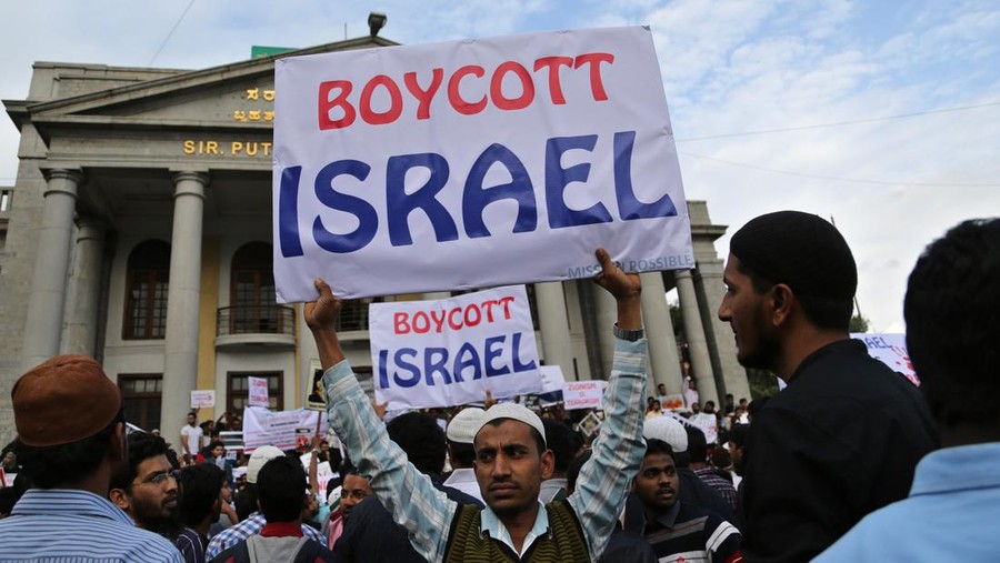 India Israel Palestinians Indian Muslims hold placards during a demonstration to protest against Israeli airstrikes on Gaza strip, in Bangalore, India, Thursday, July 17, 2014. (AP Photo/Aijaz Rahi)
