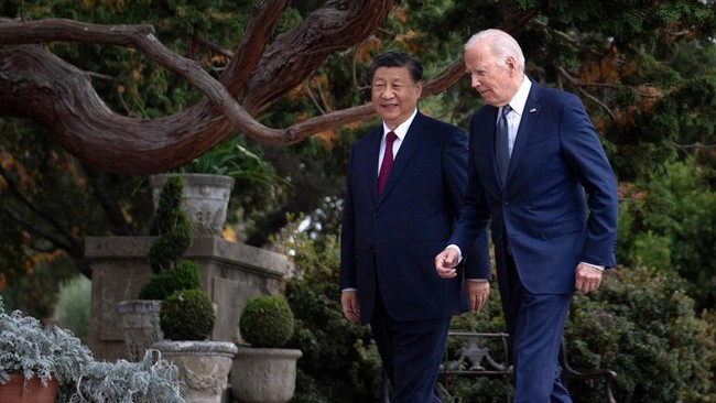 Xi Jinping mengatakan China berniat bersatu kembali dengan Taiwan dengan cara damai dan bukan dengan kekerasan.