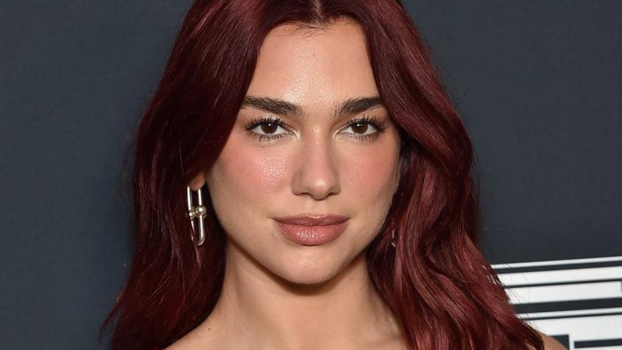 English-Albanian singer Dua Lipa arrives for Variety's Power of Women event at Mother Wolf in Los Angeles, California, on November 16, 2023. The 2023 honorees include US singer Fantasia Barrino, US singer-songwriter Billie Eilish, English actress Carey Mulligan, US actress Lily Gladstone, British actress Emily Blunt, and Margot Robbies LuckyChap. (Photo by LISA O'CONNOR / AFP)