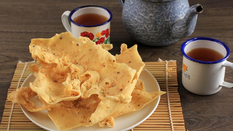 Rempeyek or Peyek Rebon is a Deep Fried Savoury Javanese Cracker Made from Rice flour and Udang Rebon. Popular in Malaysia and Indonesia. Served with Tea