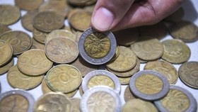 Harga Koin Sawit yang Ditarik BI Tembus Rp5 Juta di Marketplace