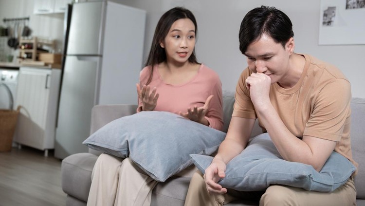 Young married couple asian husband and wife are arguing, angry couple ignoring each other, relationship trouble concept.
