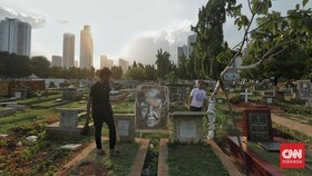 FOTO: Pameran Lukisan di Kampung Pemulung dan Kuburan