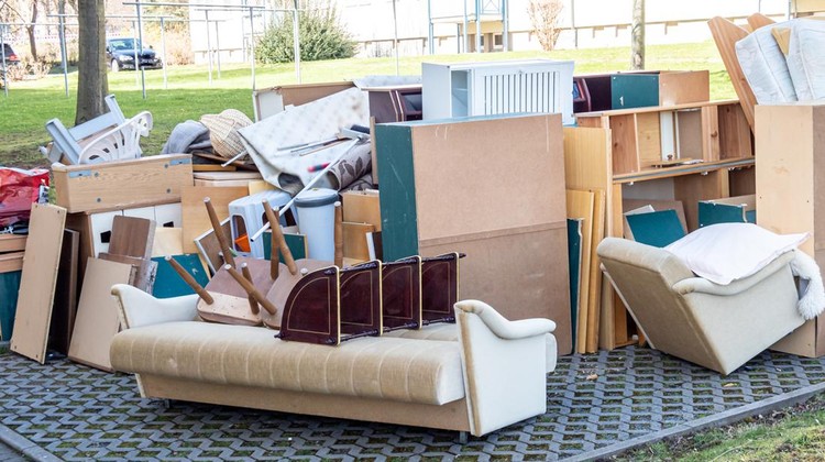 perabotan bekas old broken furnitures thrown at side of street in Florida