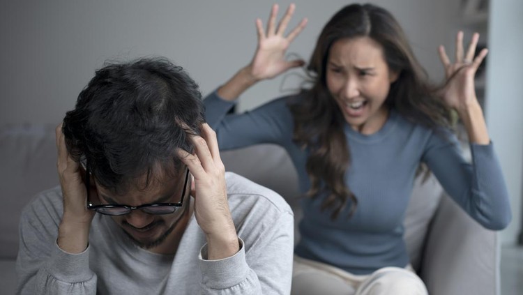 Asian couple arguing shouting blaming each other of problem, husband and wife fighting at home, relationship Problems concept