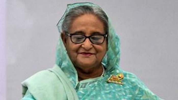 Bangladesh's Prime Minister Sheikh Hasina casts her vote at a polling station in Dhaka on January 7, 2024. Bangladesh began voting on January 7, in an election guaranteed to give a fifth term in office to Prime Minister Sheikh Hasina, after a boycott led by an opposition party she branded a 