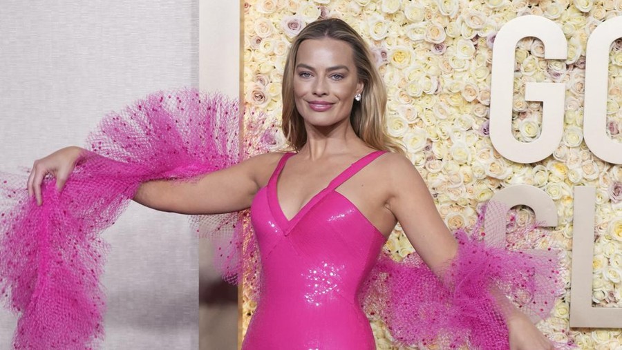 Margot Robbie arrives at the 81st Golden Globe Awards on Sunday, Jan. 7, 2024, at the Beverly Hilton in Beverly Hills, Calif. (Photo by Jordan Strauss/Invision/AP)