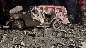 This handout photograph released and taken on January 16, 2024 by Kurdistan 24 broadcast news station shows a car wreck at a site hit by a missile attack launched by Iran's Islamic Revolutionary Guard Corps (IRGC), in Arbil, the capital of Iraq's nor