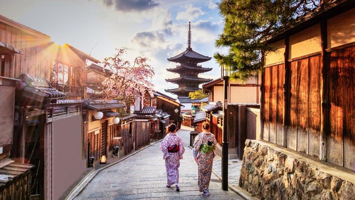 Kyoto - Japan - April 9, 2017:Yasaka Pagoda and Sannen Zaka Street, Kyoto, Japan. Tourists wander down the narrow streets of the Higashiyama District neighbourhood in Kyoto, Japan
