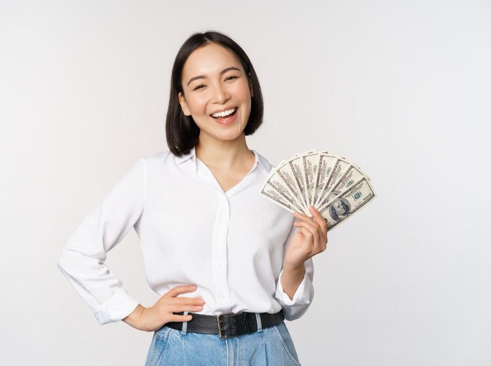Memiliki banyak uang/Foto:freepik.com/freepik Memiliki banyak uang/Foto:freepik.com/freepik